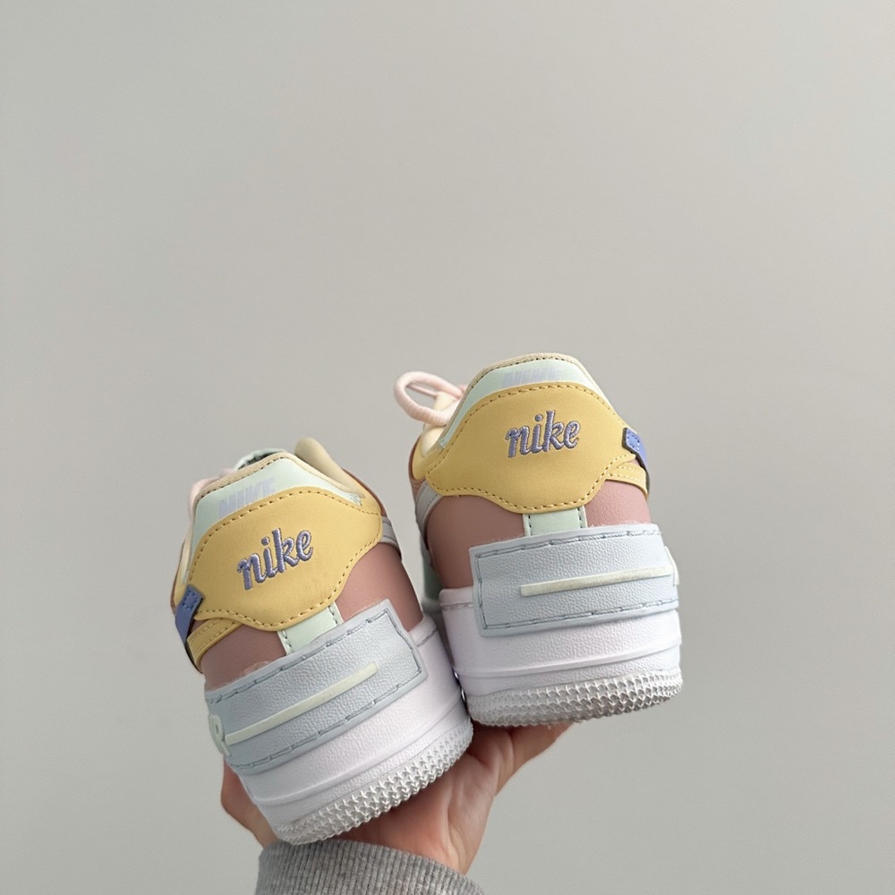 Nike Low-Top Sneakers in Pastel Yellow, Pink & Light Blue